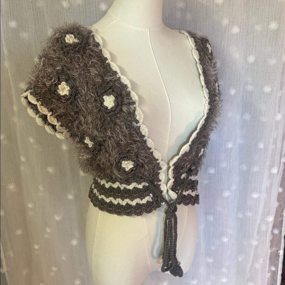 Adorable Never worn shrug.  Neiman Marcus
